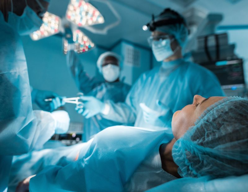 patient lying on operating table during surgery